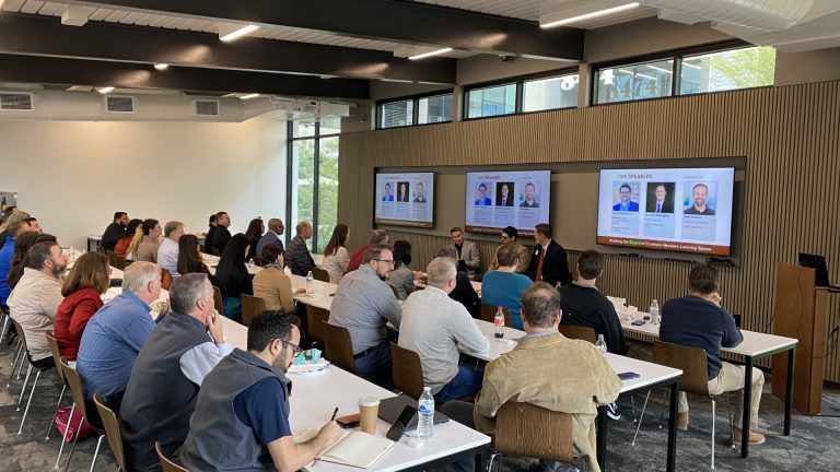 Crowd at Education LMS Event listening to keynote speakers