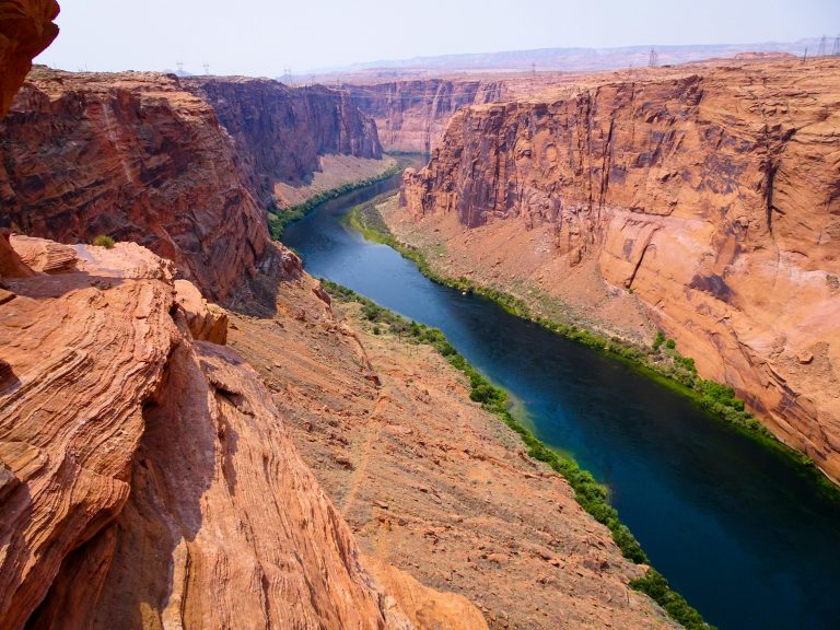 Winding Colorado river through red rock Grand canyon