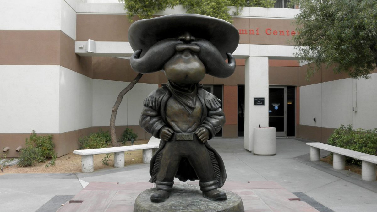 Las Vegas -  February 5, 2010: Hey Reb, a Western frontiersman, Statue at UNLV .  Unveiled in September 2007 in the Courtyard of the Richard Tam Alumni Center.